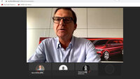 Moderator und Teilnehmer in einer Online-Konferenz über Mobilität